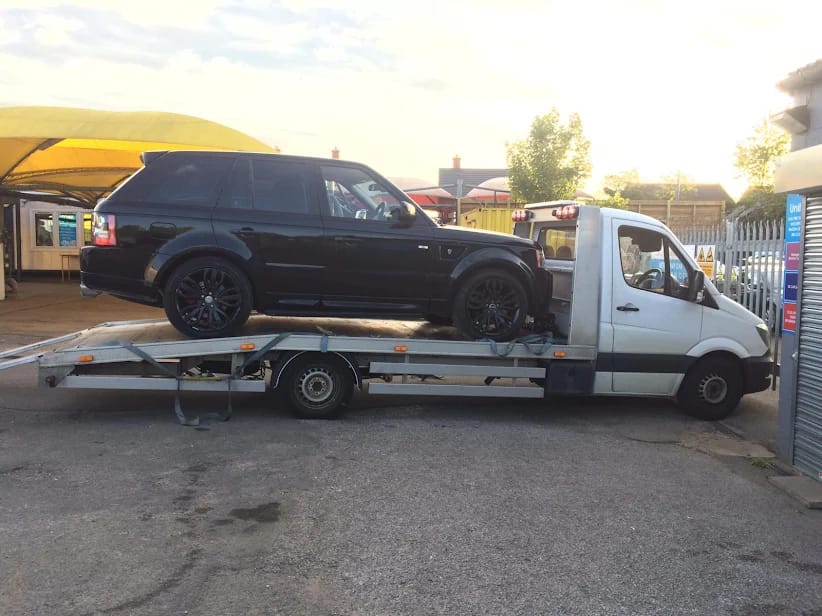 Range Rover Sport recovery at sunset — Awan Recovery MK